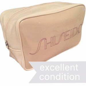 SOLD Shiseido: toiletries bag in pearl ivory